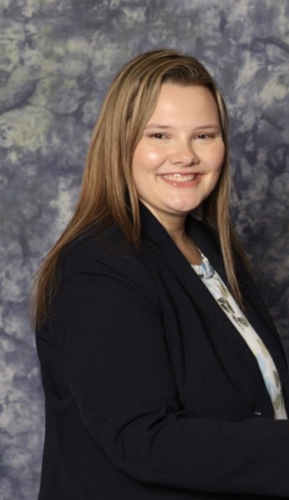 A headshot of Shelby Ogozaly